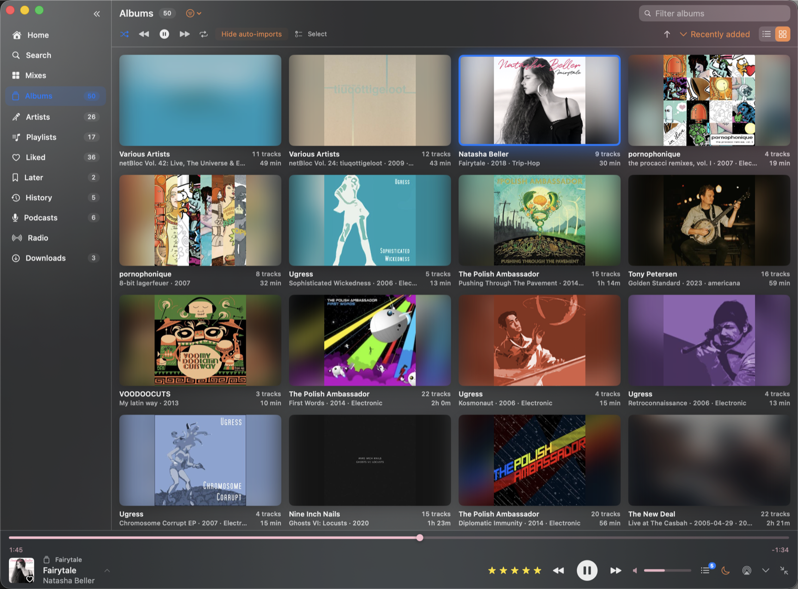 Baton's Albums grid: a wall of cover art with track counts and durations, section
                  counts in the sidebar, and the now-playing bar along the bottom.